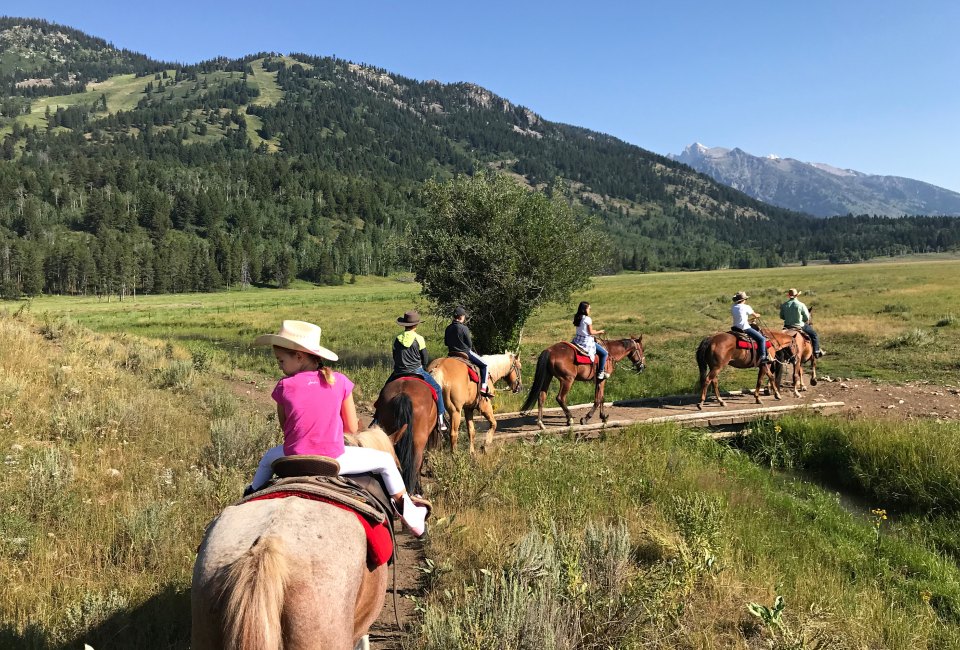 Try a horseback riding adventure on a family visit to Jackson Hole, Wyoming
