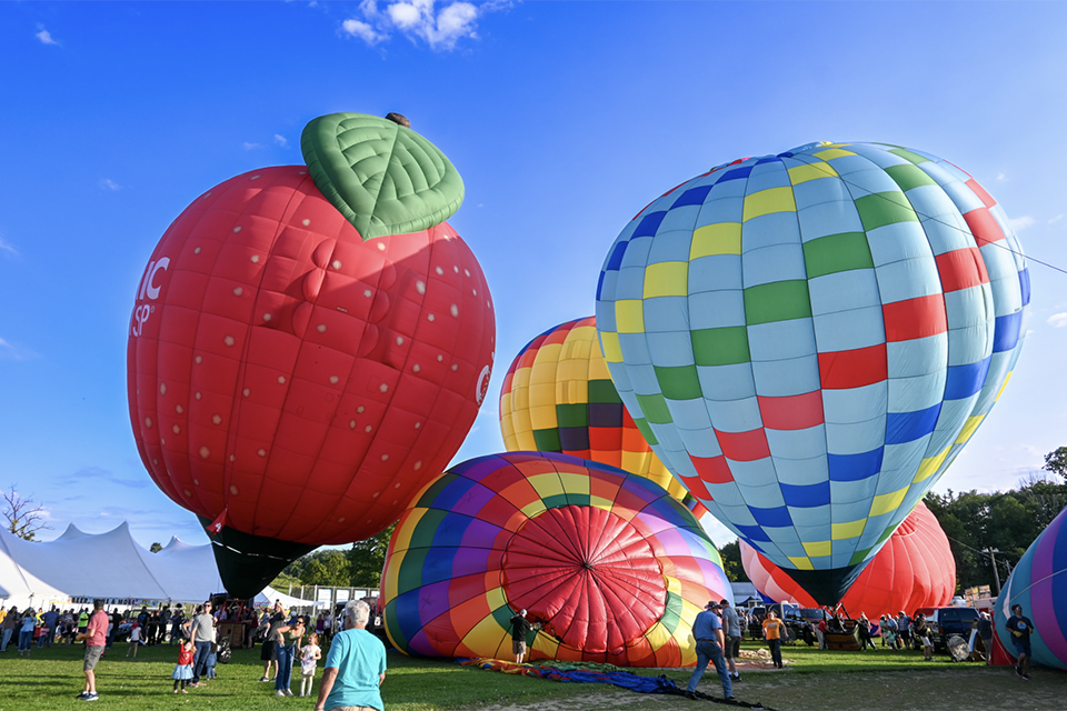 Gaze at the rainbow-hued hot-air balloons as they are inflated and take to the sky during the Hudson Valley Hot-Air Balloon Festival and book your own balloon ride. Photo courtesy of the festival